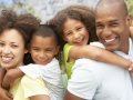 Portrait of Happy Family In Park